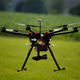 A hexacopter drone is flown during a drone demonstration at a farm and winery on potential use for board members of the National Corn Growers, Thursday, June 11, 2015 in Cordova, Md. Routine commercial use of small drones got a green light from the Obama administration June 21, 2016, after years of struggling to write regulations that would both protect public safety and unleash the economic potential and societal benefits of the new technology. (AP Photo/Alex Brandon)